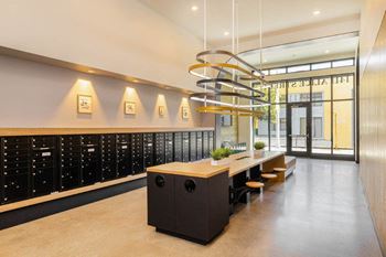 a large wine cellar with a long table and chairs and a spiral light above it